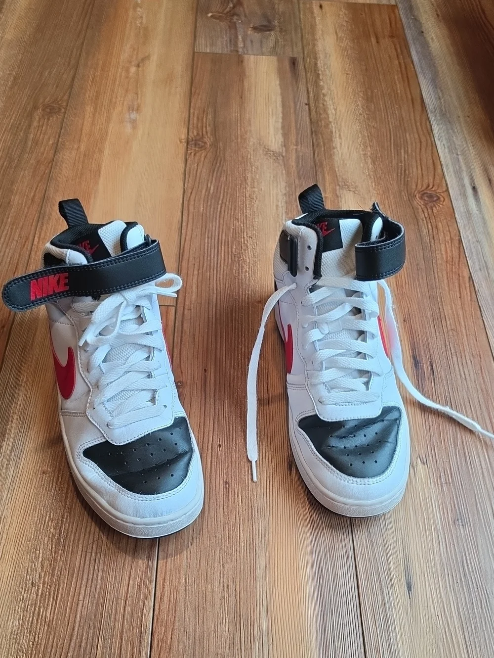 Nike Kids White High-Top Sneakers with Black and Red Accents
